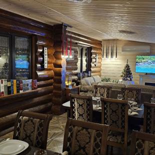 Каминный зал в Hygge Lakes & Forest Club